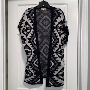 Short sleeve cardigan sweater. Size small.